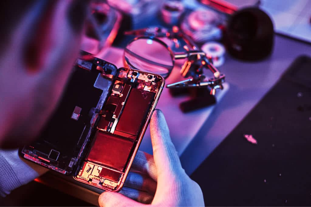 technician carefully inspect the internal parts of PY29QRN